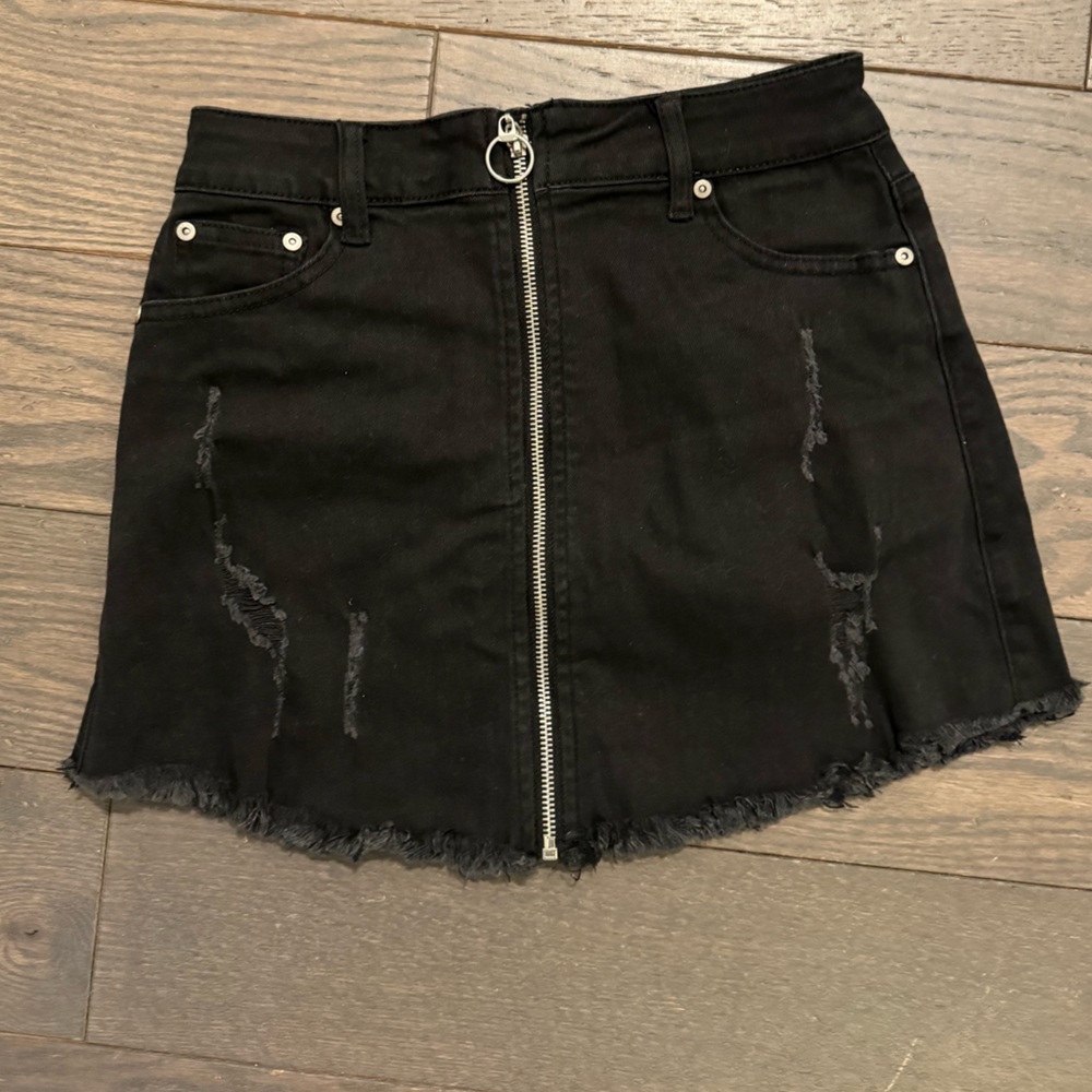Black denim mini skirt with front zipper